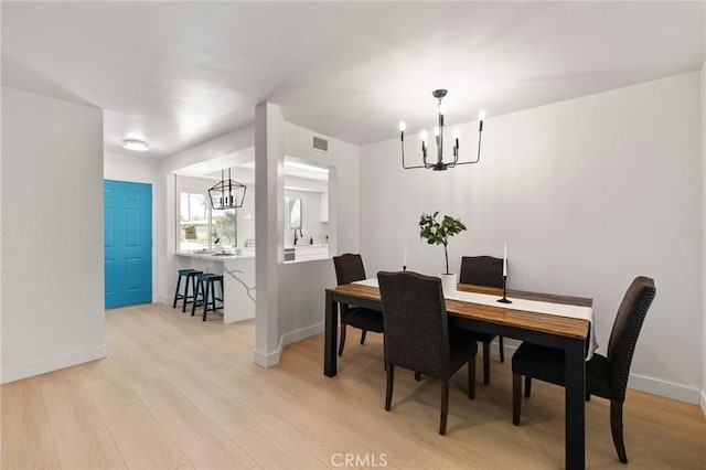 2321 W 182nd St, Torrance, CA 90504 - dining space featuring a chandelier and light wood finished floors