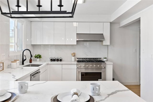 2321 W 182nd St, Torrance, CA 90504 - kitchen with ventilation hood, appliances with stainless steel finishes, white cabinets, backsplash, and light stone countertops