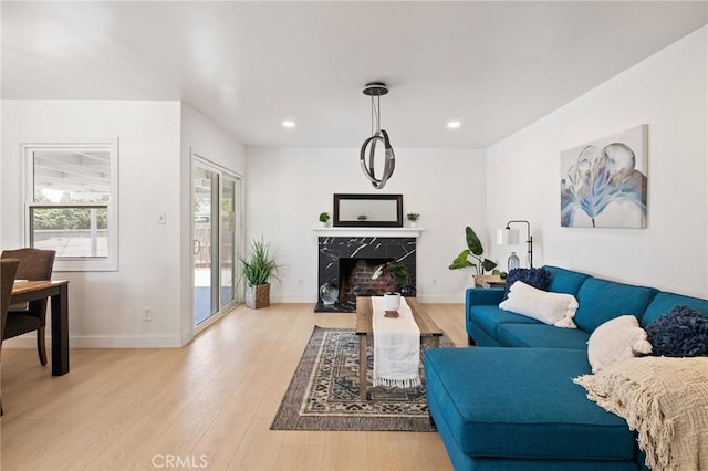 2321 W 182nd St, Torrance, CA 90504 - living area featuring light wood-type flooring, a premium fireplace, and recessed lighting