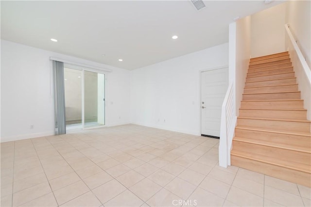 9570 Bluewater Pl, Rancho Cucamonga, CA 91730 - spare room featuring recessed lighting, stairway, and light tile patterned floors
