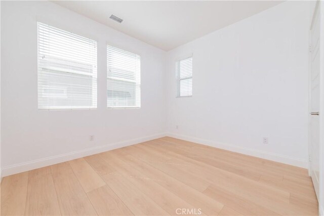 9570 Bluewater Pl, Rancho Cucamonga, CA 91730 - spare room with light wood-type flooring and baseboards