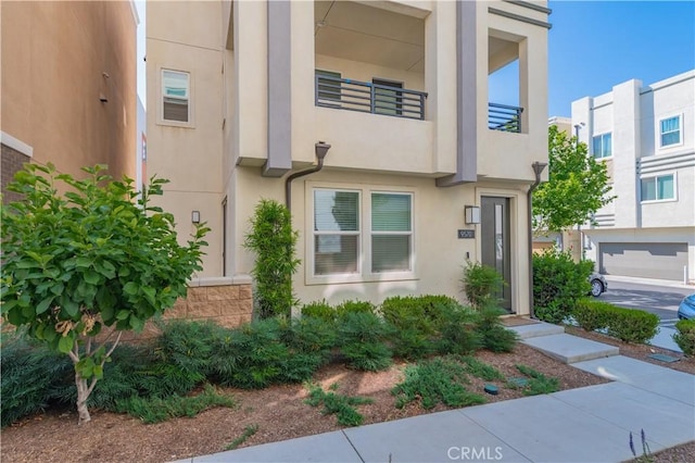 9570 Bluewater Pl, Rancho Cucamonga, CA 91730 - view of front facade with stucco siding