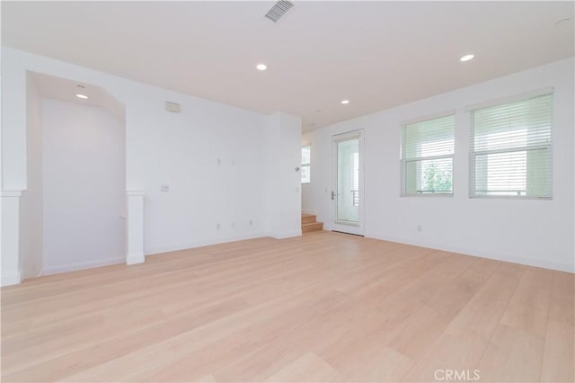 9570 Bluewater Pl, Rancho Cucamonga, CA 91730 - empty room with recessed lighting and light wood finished floors