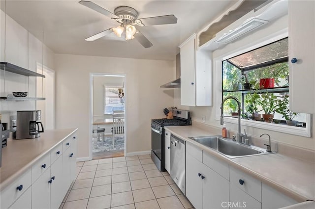 5353 W 121st St, Hawthorne, CA 90250 - kitchen with stainless steel appliances, light countertops, and white cabinetry
