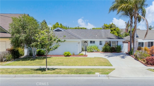 11752 Pine St, Los Alamitos, CA 90720 - ranch-style home featuring concrete driveway and a front yard