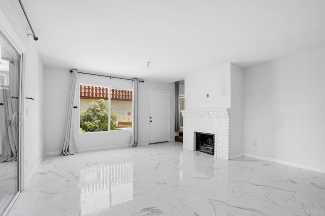 3050 Suncrest Dr Unit 7, San Diego, CA 92116 - unfurnished living room featuring marble finish flooring and a brick fireplace