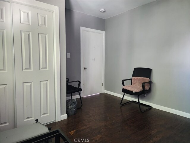 4312 Walton Ave, Los Angeles, CA 90037 - sitting room featuring baseboards and dark wood finished floors