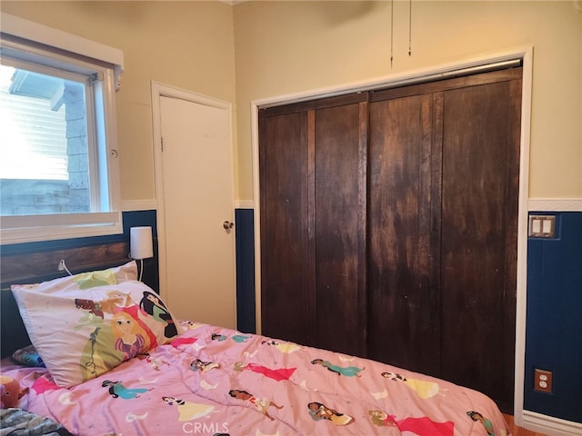 4312 Walton Ave, Los Angeles, CA 90037 - bedroom with a closet and wainscoting
