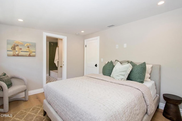 1036 S Madison Ave, Pasadena, CA 91106 - bedroom with light wood-style flooring and recessed lighting