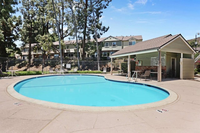 11935 Royal Rd Unit E, El Cajon, CA 92021 - community pool featuring a patio area and a residential view
