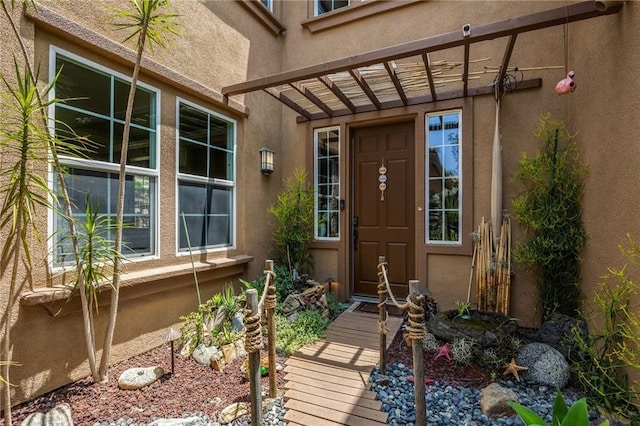 17286 Coriander Ct, Yorba Linda, CA 92886 - doorway to property featuring stucco siding and a surveillance system