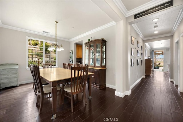 17286 Coriander Ct, Yorba Linda, CA 92886 - dining area with dark wood-type flooring, a chandelier, and ornamental molding