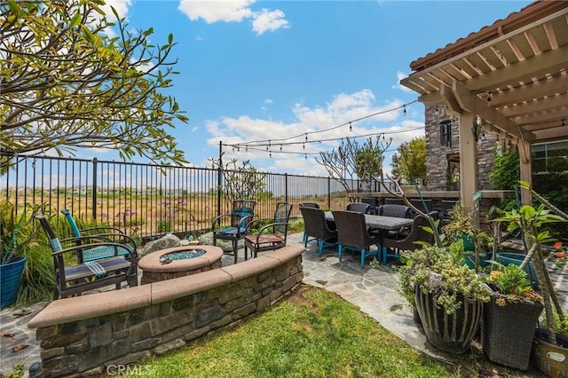 17286 Coriander Ct, Yorba Linda, CA 92886 - view of patio / terrace featuring a fire pit, a pergola, and outdoor dining area