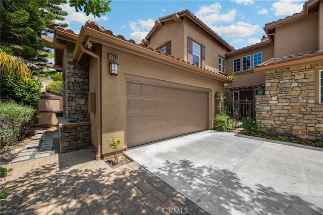 17286 Coriander Ct, Yorba Linda, CA 92886 - view of front of house featuring stone siding, driveway, and stucco siding