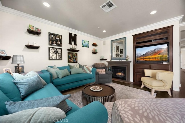 17286 Coriander Ct, Yorba Linda, CA 92886 - living room with ornamental molding, recessed lighting, a glass covered fireplace, and wood finished floors