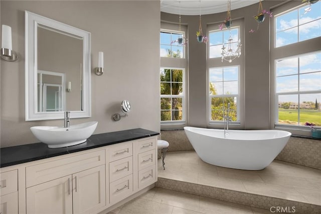 17286 Coriander Ct, Yorba Linda, CA 92886 - full bathroom featuring vanity, healthy amount of natural light, a freestanding bath, and tile patterned floors