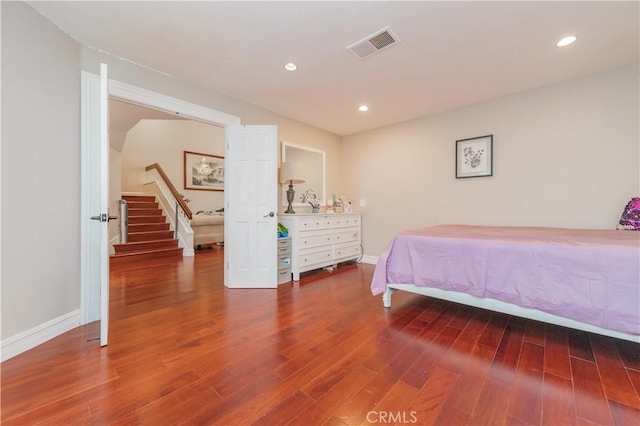 10 La Quinta Unit 21, Irvine, CA 92612 - bedroom featuring wood finished floors and recessed lighting