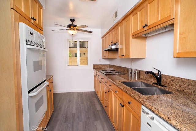 8131 Canby Ave Unit 5, Reseda, CA 91335 - kitchen with under cabinet range hood, white appliances, a ceiling fan, dark wood finished floors, and light stone countertops