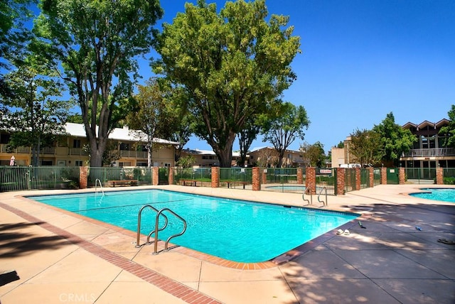 8131 Canby Ave Unit 5, Reseda, CA 91335 - community pool with a patio and a residential view