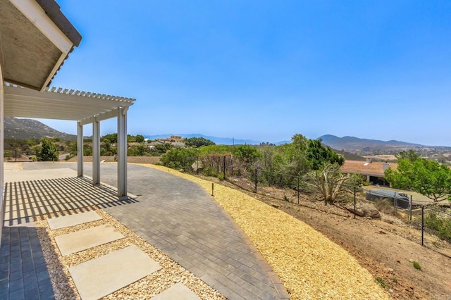 14694 Chaparral Slope Rd, Jamul, CA 91935 - view of yard with a pergola, a patio area, and a mountain view
