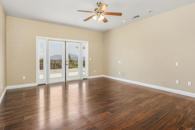 14694 Chaparral Slope Rd, Jamul, CA 91935 - empty room with a ceiling fan, french doors, dark wood finished floors, a mountain view, and recessed lighting