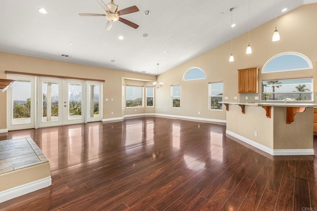 14694 Chaparral Slope Rd, Jamul, CA 91935 - unfurnished living room featuring healthy amount of natural light, a ceiling fan, dark wood-type flooring, high vaulted ceiling, and recessed lighting