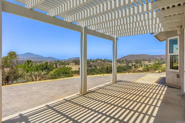 14694 Chaparral Slope Rd, Jamul, CA 91935 - view of patio featuring a mountain view and a pergola