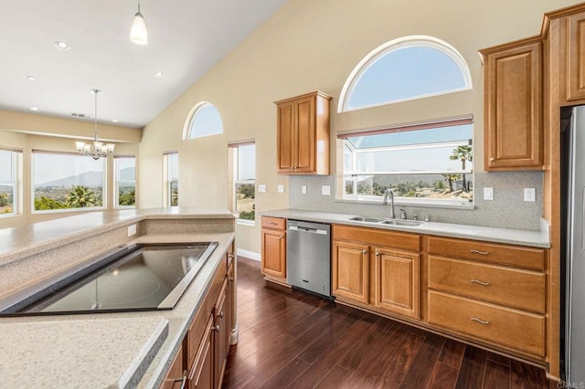 14694 Chaparral Slope Rd, Jamul, CA 91935 - kitchen featuring dishwasher, black electric cooktop, light countertops, a chandelier, and high vaulted ceiling