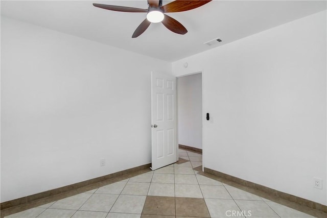 24409 Dunlavy Ct, Moreno Valley, CA 92557 - spare room featuring ceiling fan and light tile patterned floors