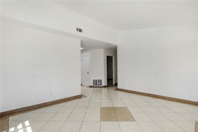 24409 Dunlavy Ct, Moreno Valley, CA 92557 - unfurnished room featuring baseboards and light tile patterned floors