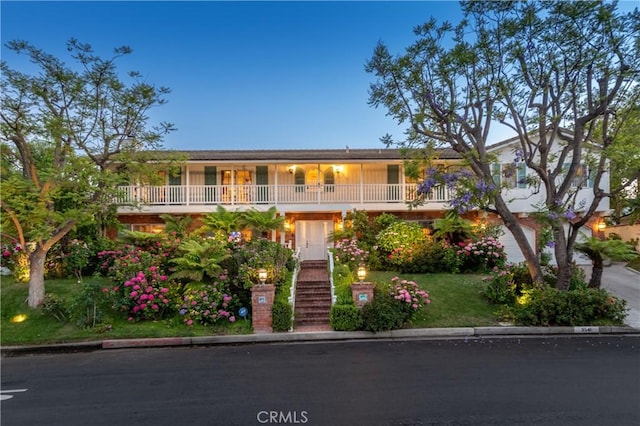 3541 Westfall Dr, Encino, CA 91436 - view of front of house with a front lawn and stairway