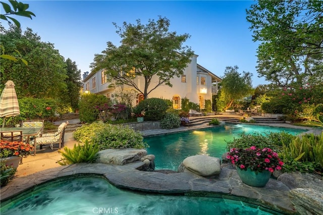 3541 Westfall Dr, Encino, CA 91436 - swimming pool featuring a patio area