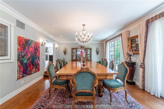 3541 Westfall Dr, Encino, CA 91436 - dining room featuring light wood-style flooring, a chandelier, ornamental molding, and recessed lighting