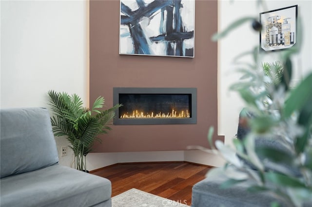 2623 Carnegie Ln, Redondo Beach, CA 90278 - living room featuring wood finished floors and a warm lit fireplace