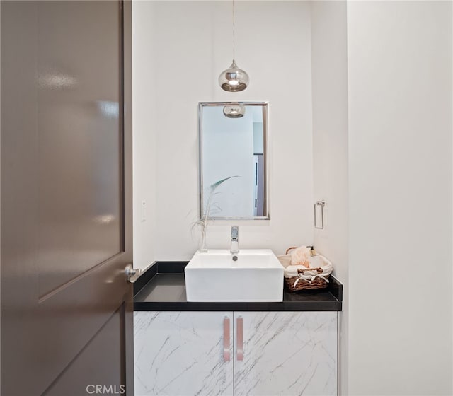 2623 Carnegie Ln, Redondo Beach, CA 90278 - bathroom featuring a sink and marble finish floors