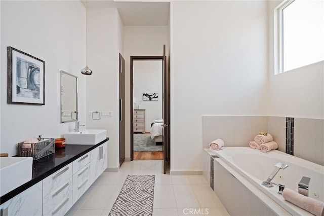 2623 Carnegie Ln, Redondo Beach, CA 90278 - full bath with double vanity, a bath, ensuite bathroom, and tile patterned flooring