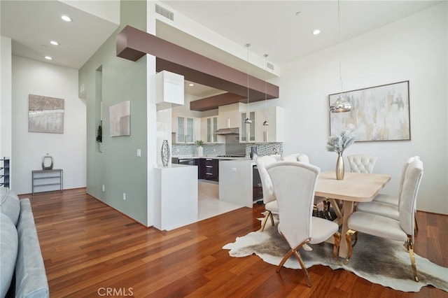 2623 Carnegie Ln, Redondo Beach, CA 90278 - dining space with light wood-type flooring and recessed lighting