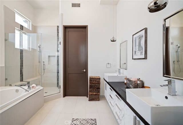 2623 Carnegie Ln, Redondo Beach, CA 90278 - bathroom with a stall shower, a garden tub, double vanity, and tile patterned flooring