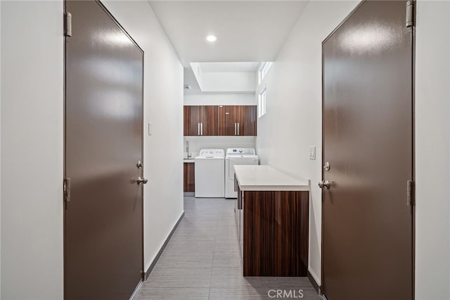 2623 Carnegie Ln, Redondo Beach, CA 90278 - washroom with cabinet space, washing machine and dryer, and recessed lighting