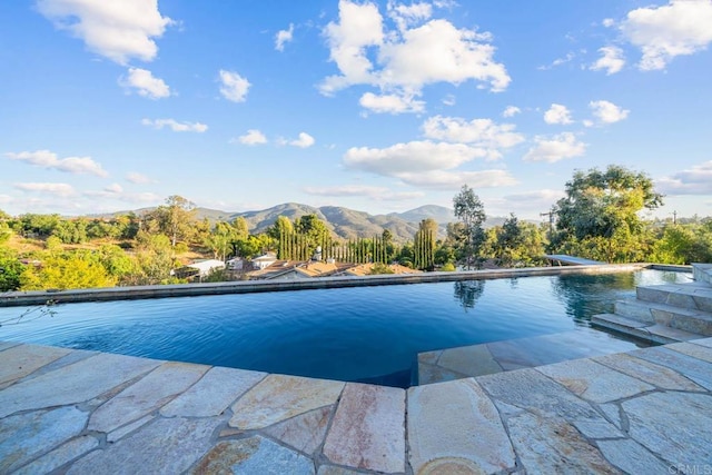 3204 Via Caliente Del Sol, Jamul, CA 91935 - outdoor pool featuring a mountain view