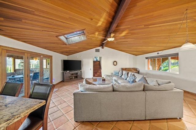3204 Via Caliente Del Sol, Jamul, CA 91935 - living room with light tile patterned floors, wood ceiling, french doors, a skylight, and a ceiling fan