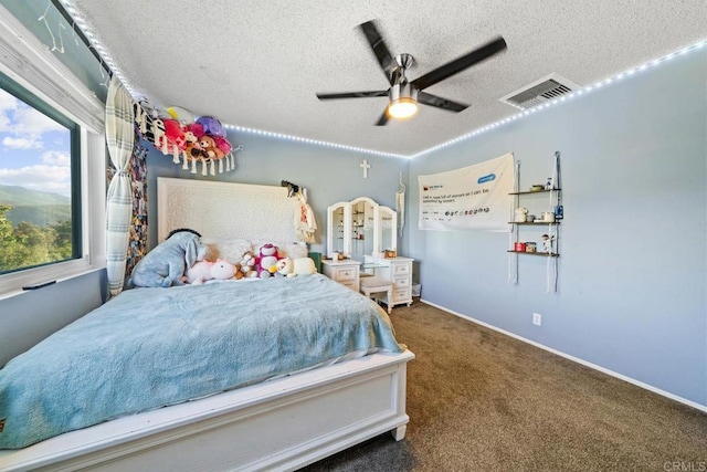 3204 Via Caliente Del Sol, Jamul, CA 91935 - bedroom featuring a textured ceiling, carpet flooring, and a ceiling fan