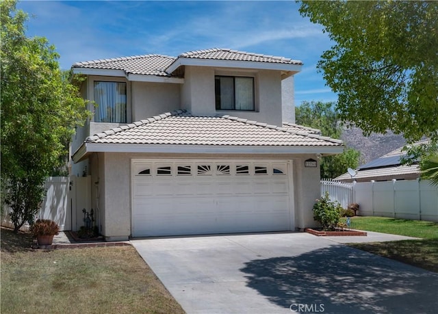 22760 Mountain View Rd, Moreno Valley, CA 92557 - view of front of property featuring stucco siding, a tile roof, driveway, and a garage