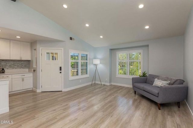 5684 Recodo Way, Camarillo, CA 93012 - living area with healthy amount of natural light, light wood finished floors, recessed lighting, and high vaulted ceiling