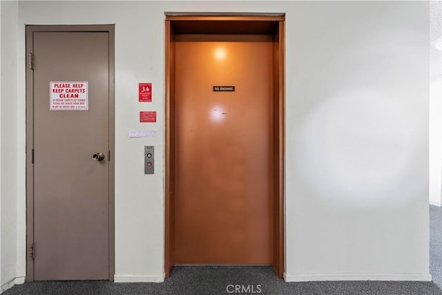 465 Ivy St Unit 301, Glendale, CA 91204 - corridor with elevator and carpet floors