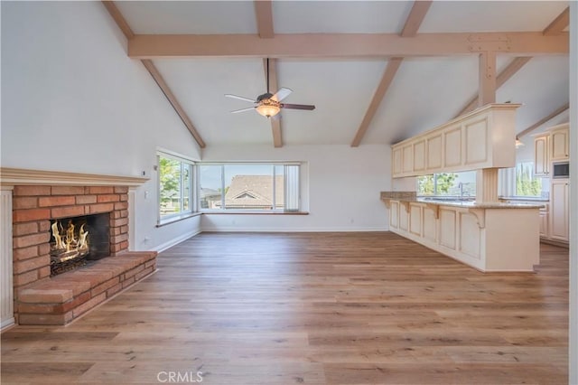 2239 Maystone Pl, Rowland Heights, CA 91748 - unfurnished living room with a ceiling fan, light wood-style flooring, and a fireplace