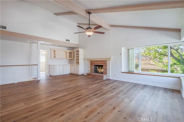 2239 Maystone Pl, Rowland Heights, CA 91748 - unfurnished living room with beamed ceiling, ceiling fan, high vaulted ceiling, light wood finished floors, and a brick fireplace