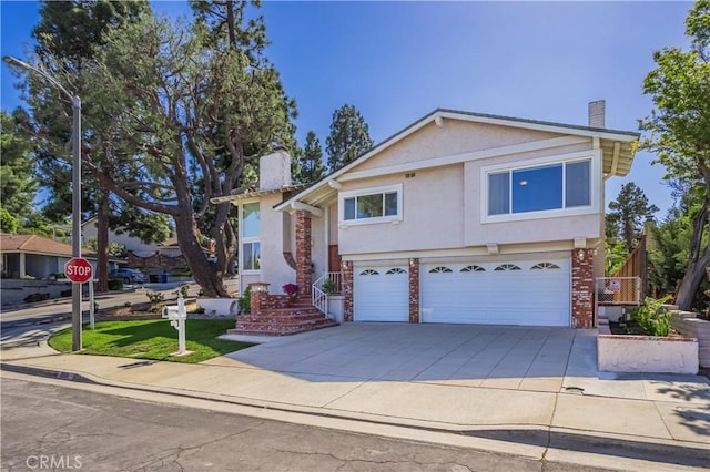 2239 Maystone Pl, Rowland Heights, CA 91748 - traditional-style house with a chimney, a garage, concrete driveway, and stucco siding