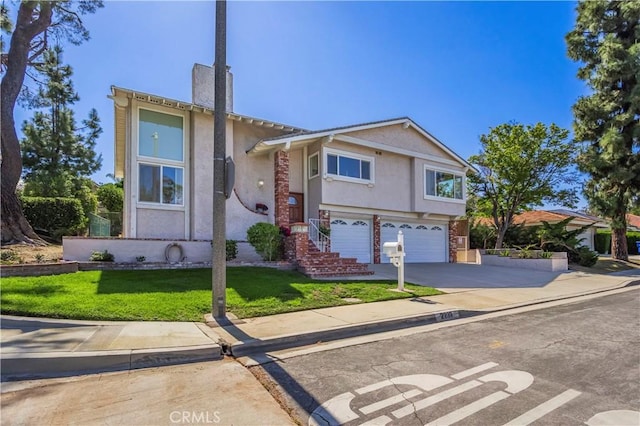 2239 Maystone Pl, Rowland Heights, CA 91748 - view of front of property featuring stucco siding, concrete driveway, a garage, and a front yard