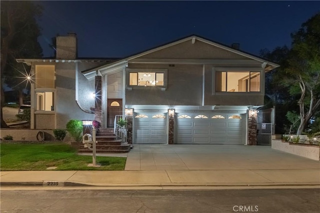 2239 Maystone Pl, Rowland Heights, CA 91748 - view of front of property with driveway, an attached garage, and a chimney